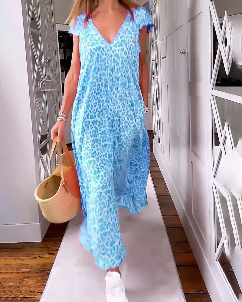 Versatile printed V-neck short sleeve maxi dress for women, ideal for casual outings or elegant events.