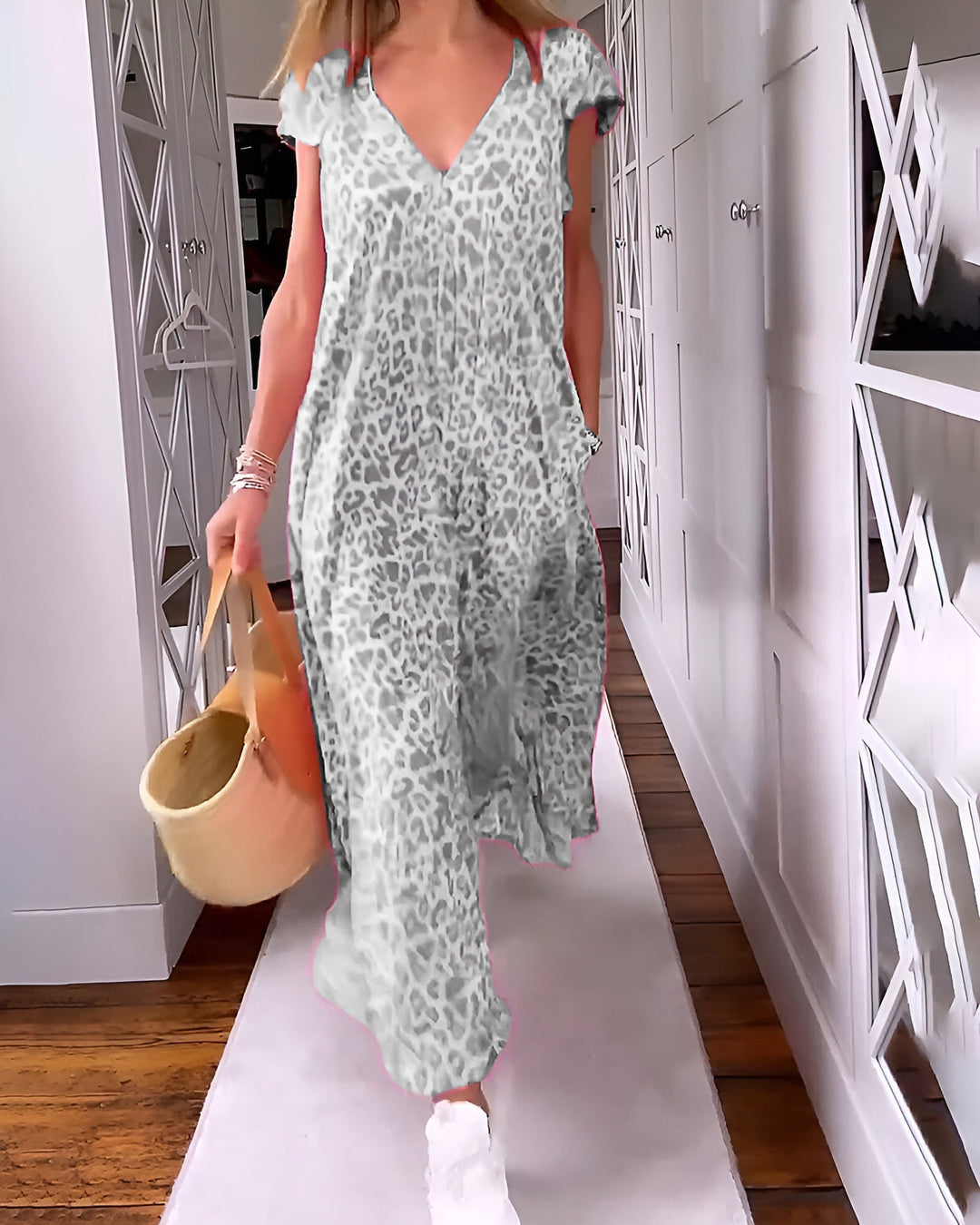 Fashionable women's patterned long dress, V-neck, short sleeve, showcasing a trendy leopard design.