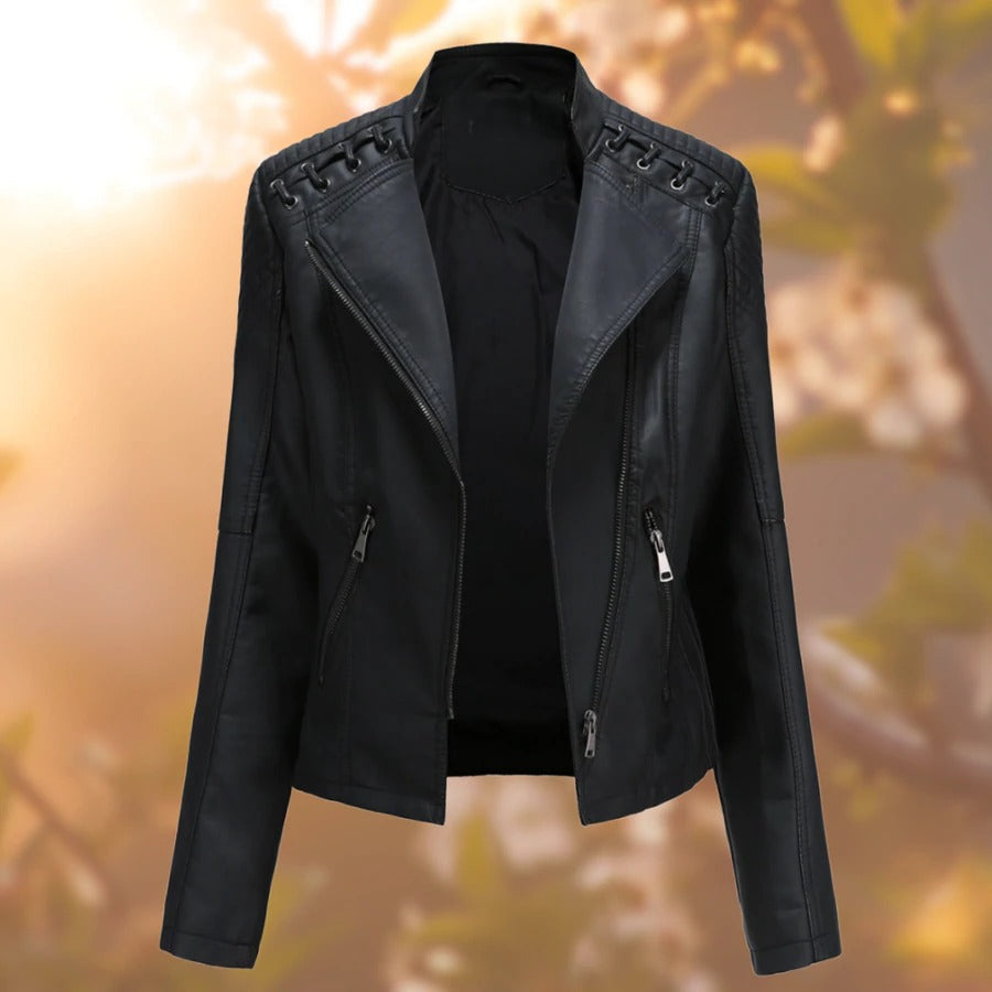 Fashionable women's moto jacket in black leather-look. Chic biker style for a confident, elegant wardrobe essential.