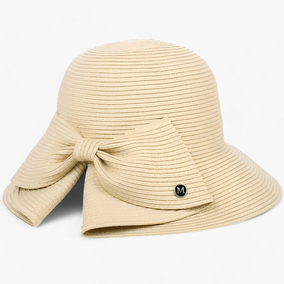 Lightweight women's straw sun hat, featuring an elegant asymmetrical bow for ultimate summer style.