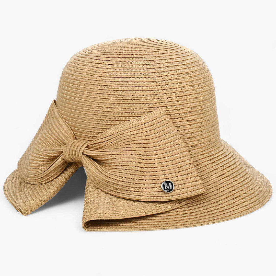 Women's straw sun hat with an elegant asymmetrical bow, perfect for beach, travel, or summer style.