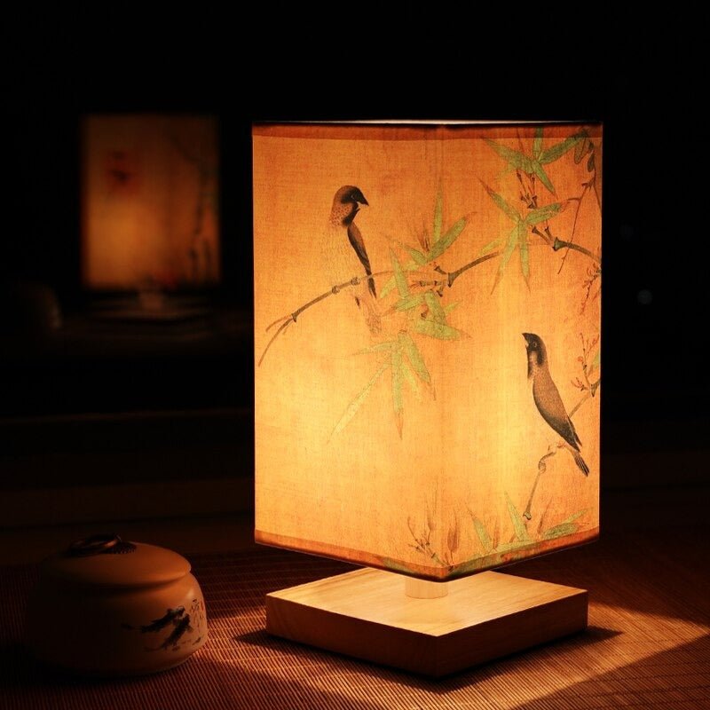Modern table lamp with textured fabric shade & Japanese print, ideal for interior accent lighting.
