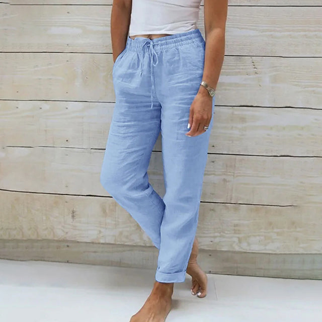 Women's relaxed fit drawstring summer pants in a light color, perfect for casual warm weather everyday style.