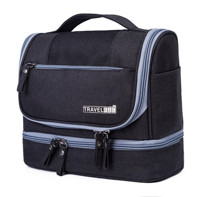 Multi-compartment travel toiletry bag organizer, keeping essentials neat & accessible while hanging.