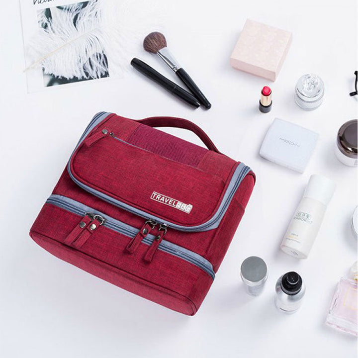 Complete travel toiletry organizer, a large capacity hanging bag with many compartments for all your needs.