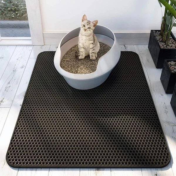Large cat litter mat traps mess, keeps floors clean. Waterproof & non-slip pet accessory for home hygiene.