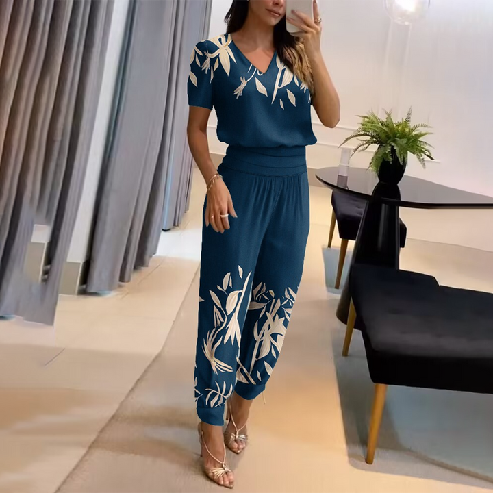 Comfortable women's printed V-neck wide-leg jumpsuit. Relaxed fit, versatile for casual or stylish outfits.