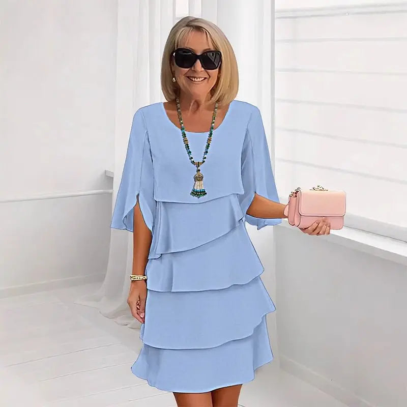 Elegant layered ruffle dress for women with three-quarter sleeves. Chic & versatile for spring & summer day-to-night fashion.