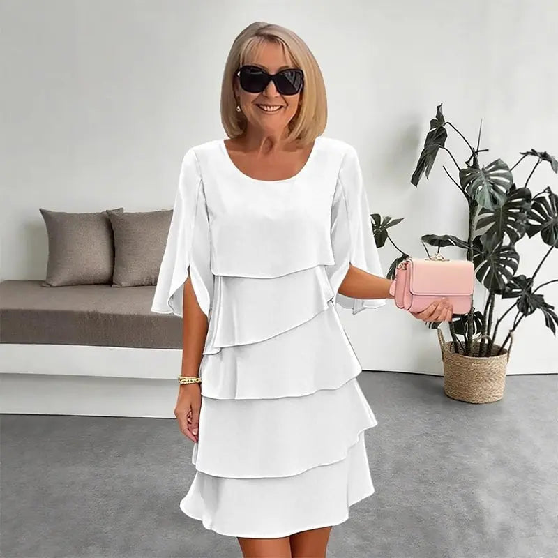 Chic women's layered ruffle dress with three-quarter sleeves. Elegant yet casual, perfect for versatile day-to-night wear.