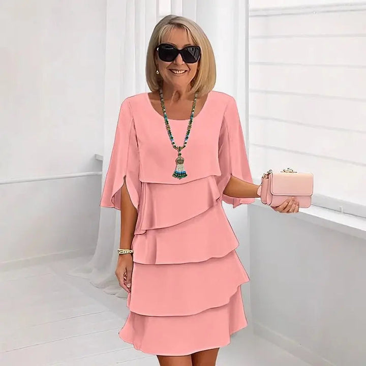 Comfortable women's elegant layered ruffle dress with three-quarter sleeves. Perfect for chic spring/summer events.