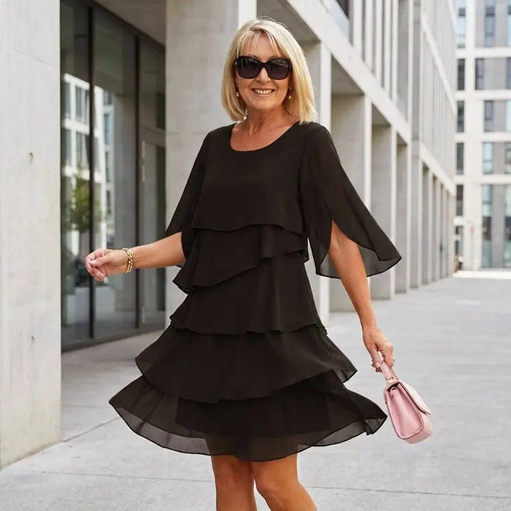 Women's tiered layered ruffle dress. Elegant design with three-quarter sleeves, comfortable for spring & summer occasions.
