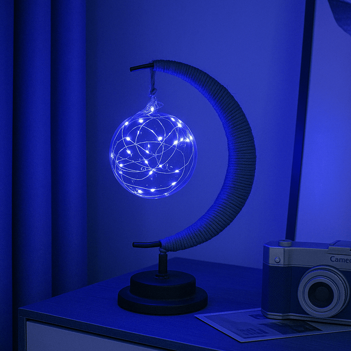 "LED Moon Star Night Light with hemp rope, moon-shaped, emits warm glow, ideal decor for cozy rooms, rustic charm."