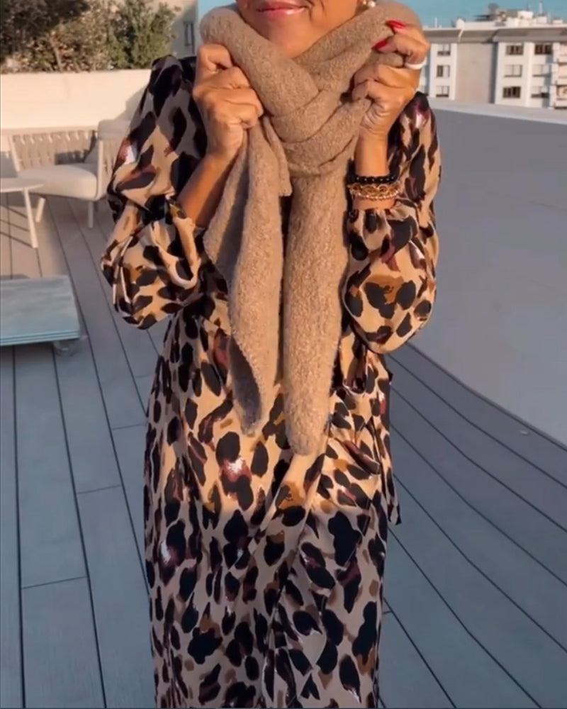 Elegant long sleeve women's leopard print midi dress, V-neck, A-line style, fashion-forward.