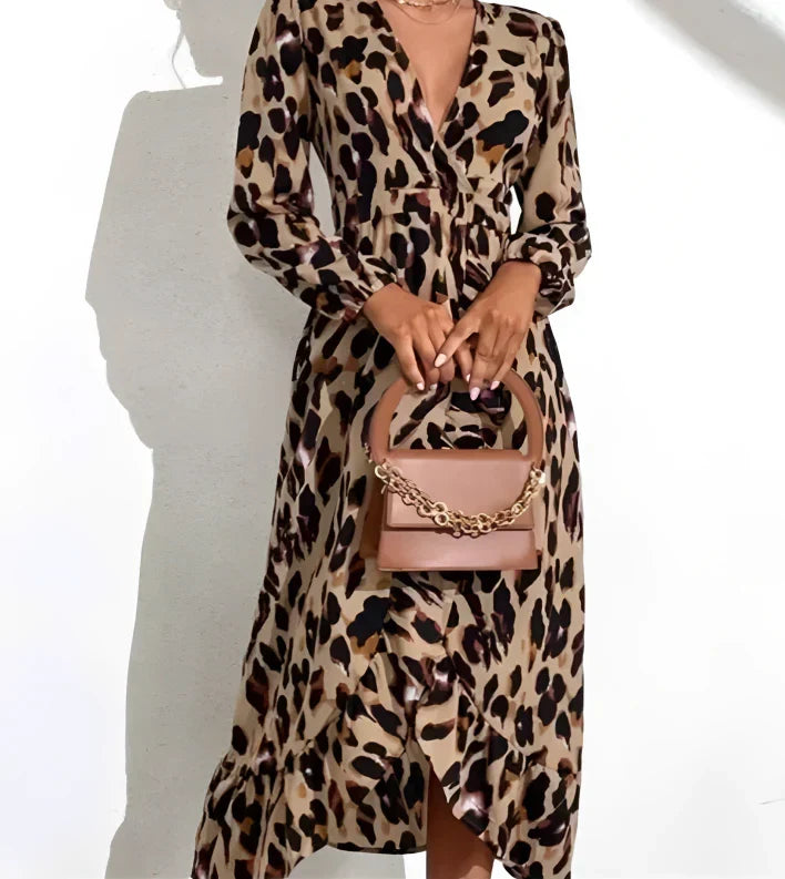 Elegant women's leopard print midi dress with V-neck and A-line silhouette, perfect for occasion wear.