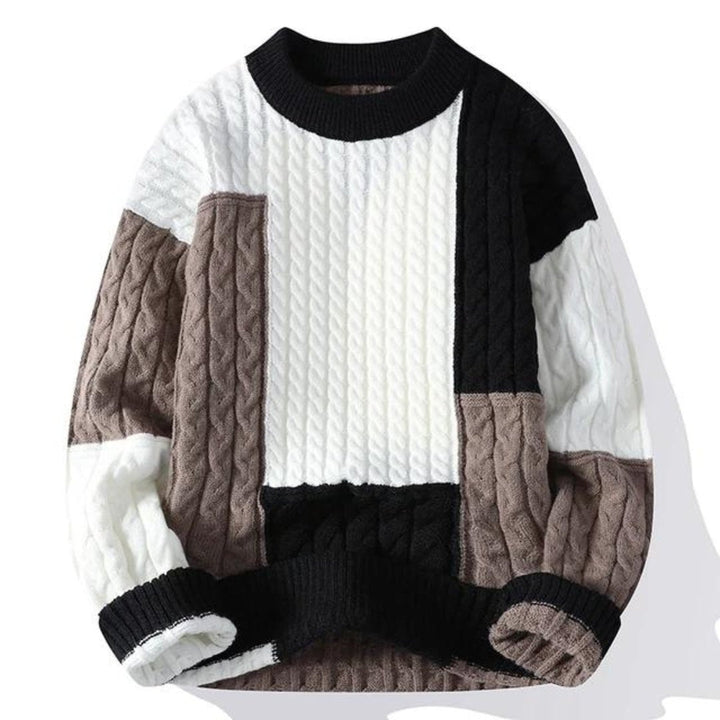 Cozy men's cable knit color block crew neck sweater. Warm long sleeve pullover with stylish patchwork design.