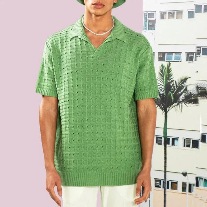 Comfortable men's short sleeve polo shirt, textured design, relaxed fit, versatile for smart casual outfits.