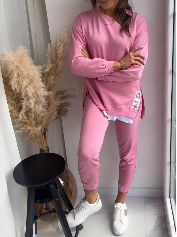 Comfortable women's two-piece loungewear set, featuring a plush sweatshirt and matching casual pants.