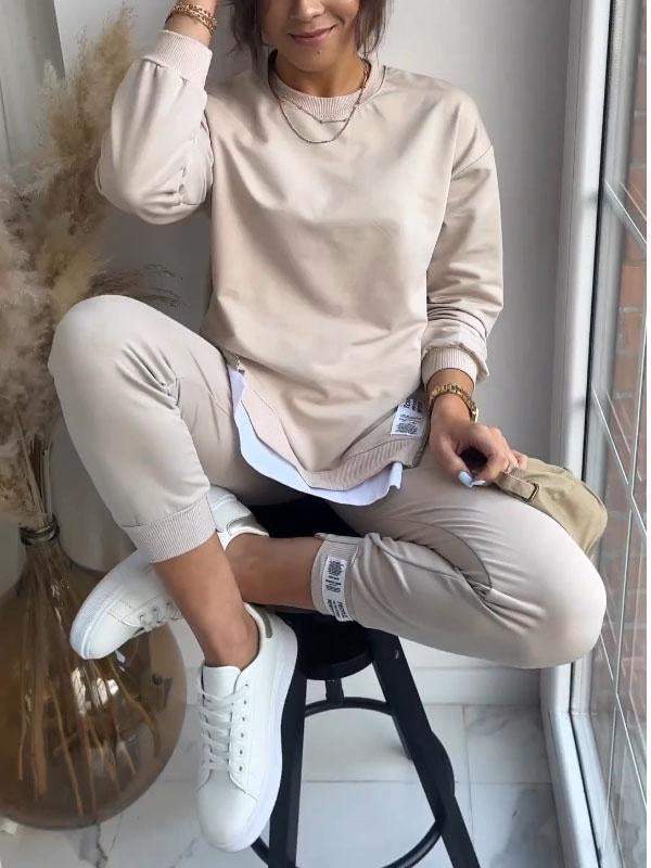 Women's premium cozy loungewear set, ideal for comfy relaxation; includes soft sweatshirt and pants.