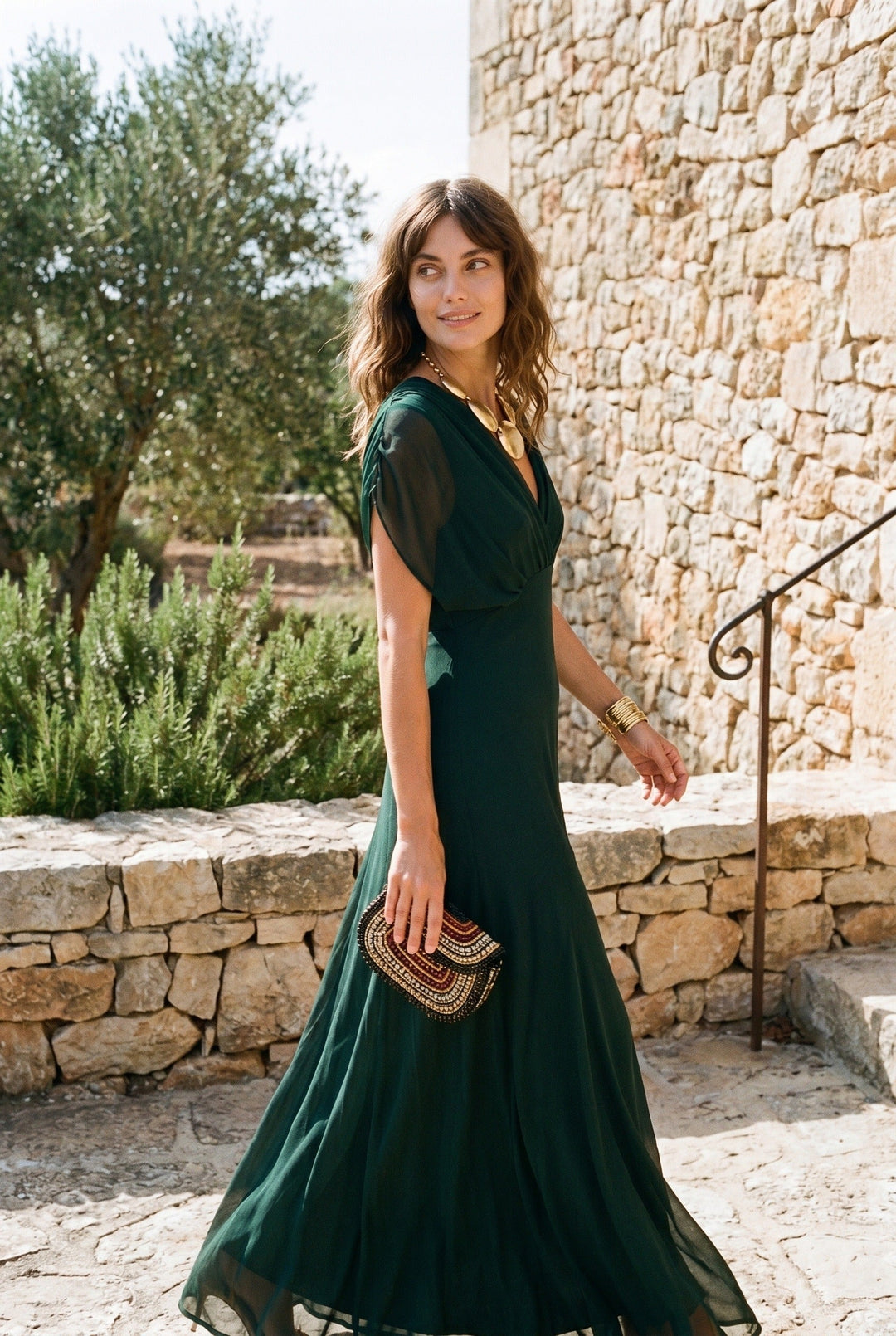 Elegant women's V-neck wrap maxi dress with sheer sleeves. Perfect for evening or formal occasions.