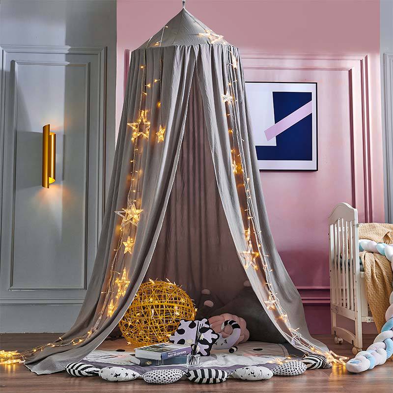 "Light green children's blackout bed canopy; elegant polyester fabric; blocks light; ideal for cribs, creating a cozy vibe."