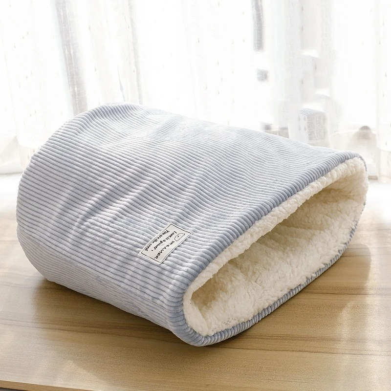 Secure cat cave bed offers warmth & comfort. A cozy pet bed, perfect for cats seeking a private feline sanctuary.