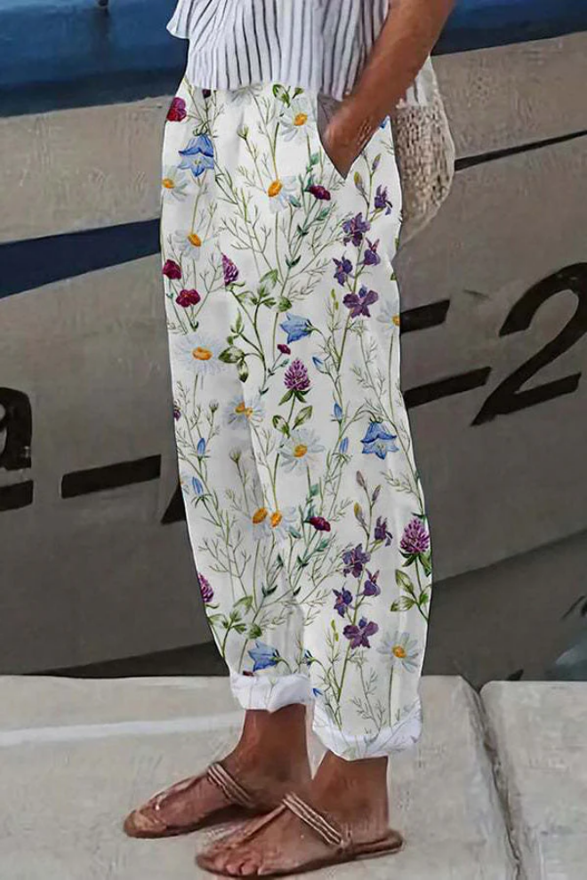 Fashionable women's printed casual pants with a modern design, stylish buttons, and practical pockets. Trendy bottoms.