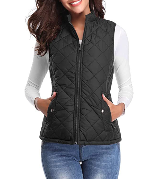 Woman modeling a stylish lightly padded vest, perfect autumn/spring layering outerwear for casual look.