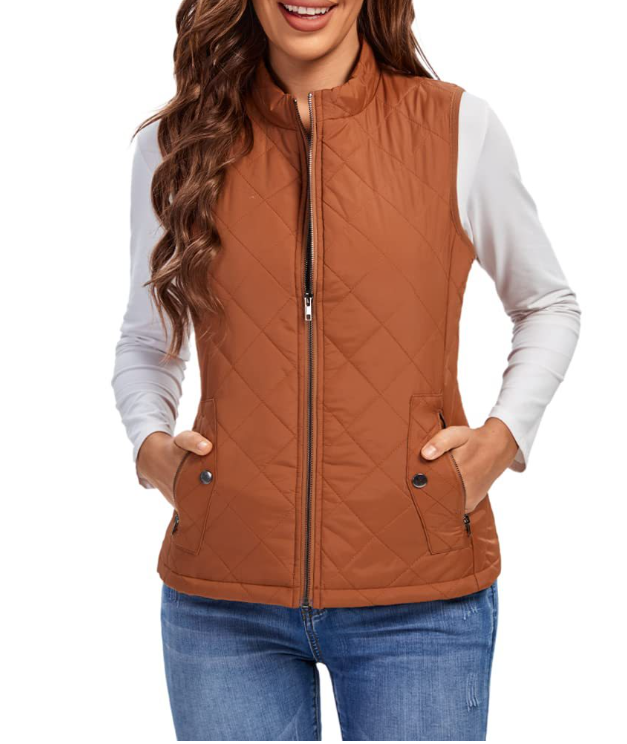 Front view of a woman wearing a casual, fashionable padded vest for transitional weather. Lightweight.