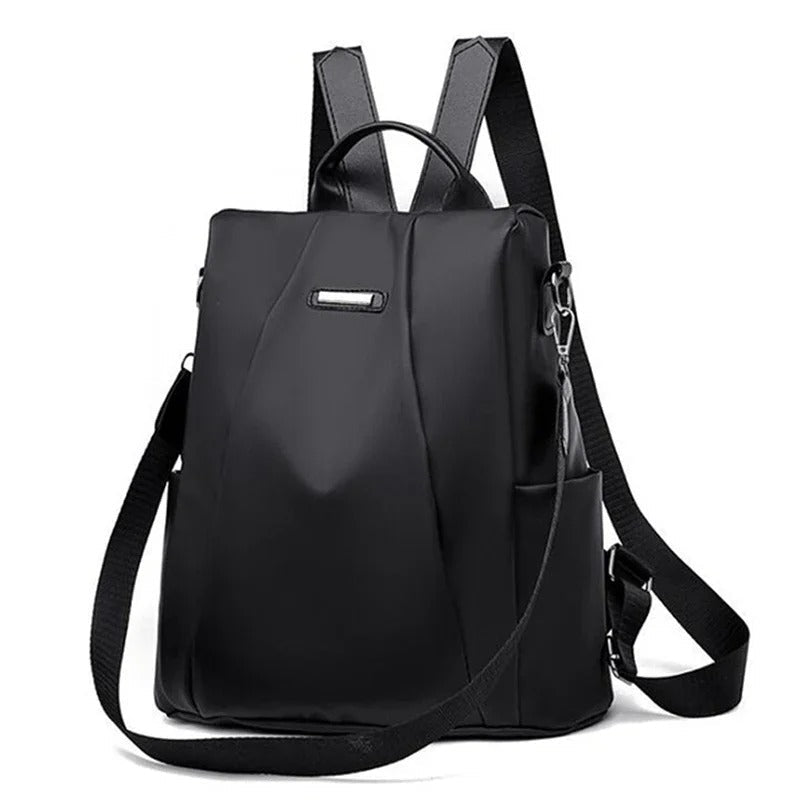 Lightweight water-resistant nylon women's backpack. Ideal everyday bag for travel, work, or school.