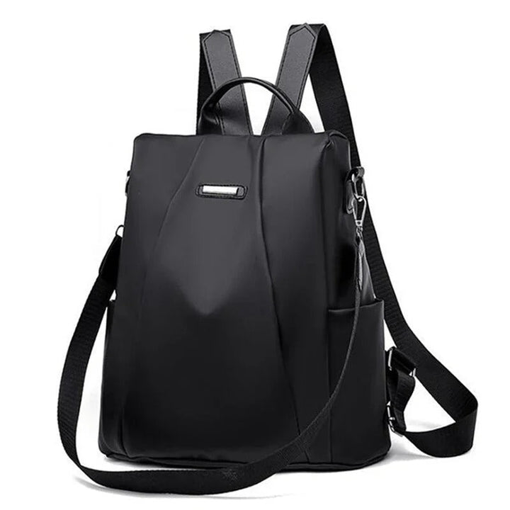 Lightweight water-resistant nylon women's backpack. Ideal everyday bag for travel, work, or school.