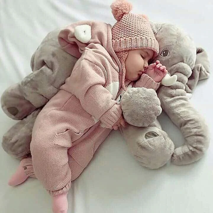 Cuddly elephant baby pillow, soft comfort for infants & toddlers, perfect for sleep & play.