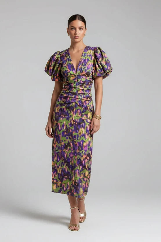 Stylish women's midi dress with a colorful floral pattern & trendy pleated sleeves, a perfect statement for spring/summer.