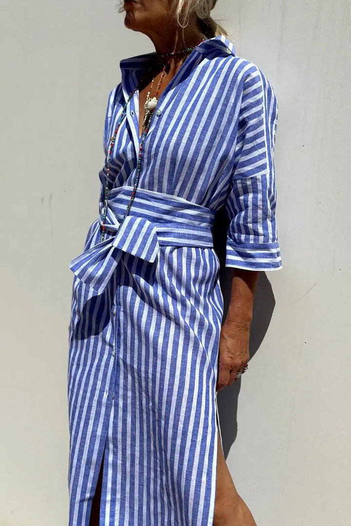 Casual women's striped midi dress featuring a classic button-down design and comfortable fit.