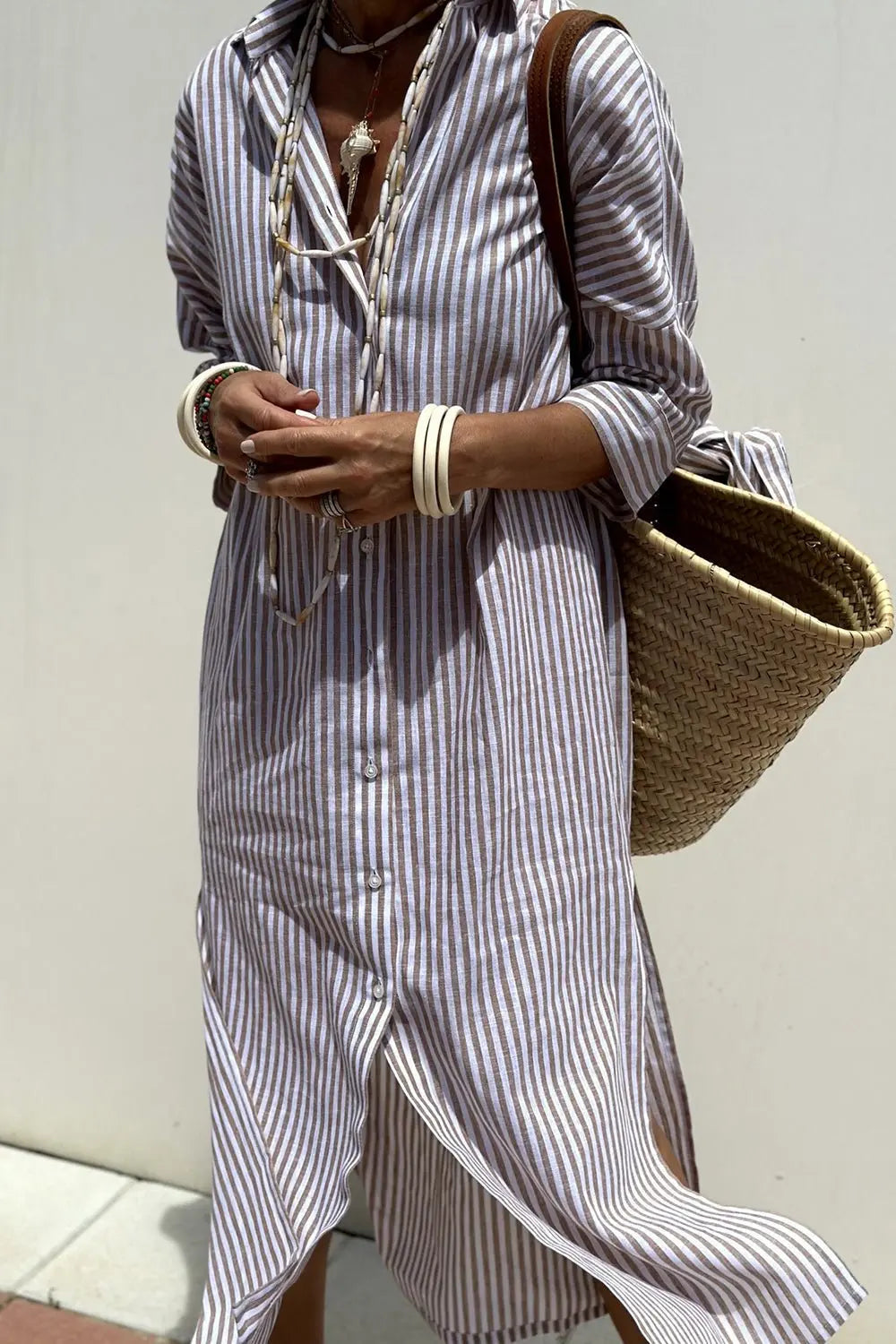 Autumn/winter women's striped midi shirt dress with button-down front, suitable for many occasions.