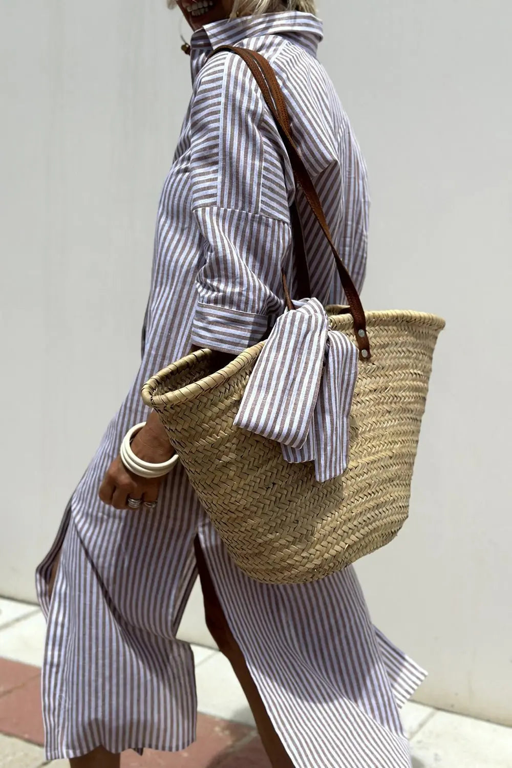 Stylish women's striped midi shirt dress, a versatile button-down piece for your fashion wardrobe.
