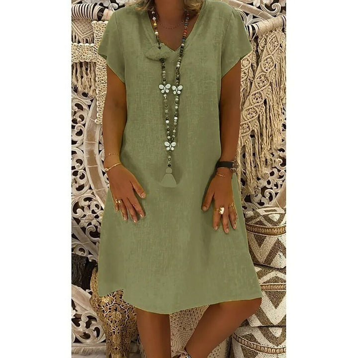 Stylish women's V-neck mini dress, a comfortable and versatile choice for house or casual evening wear.