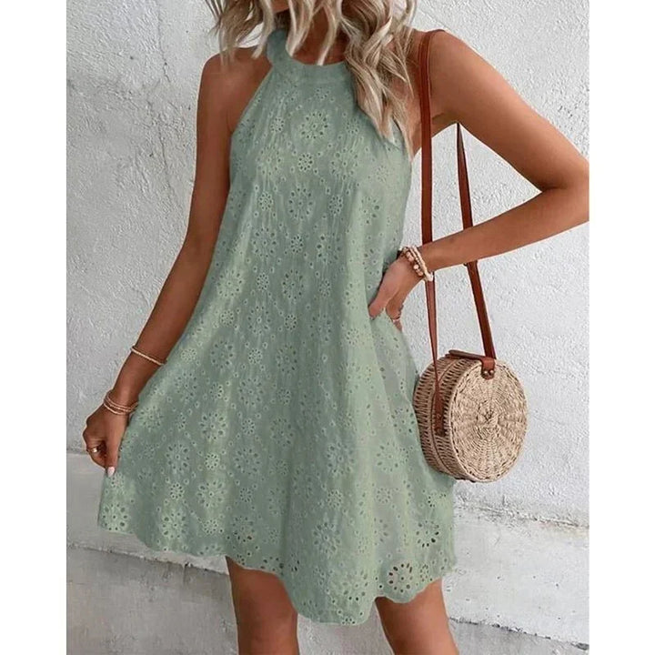 Versatile women's sleeveless mini dress for casual outings and chic everyday wear in summer.