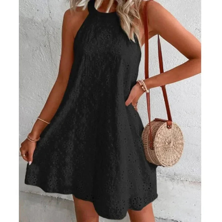 Stylish women's sleeveless mini dress, an effortless addition to any summer wardrobe.