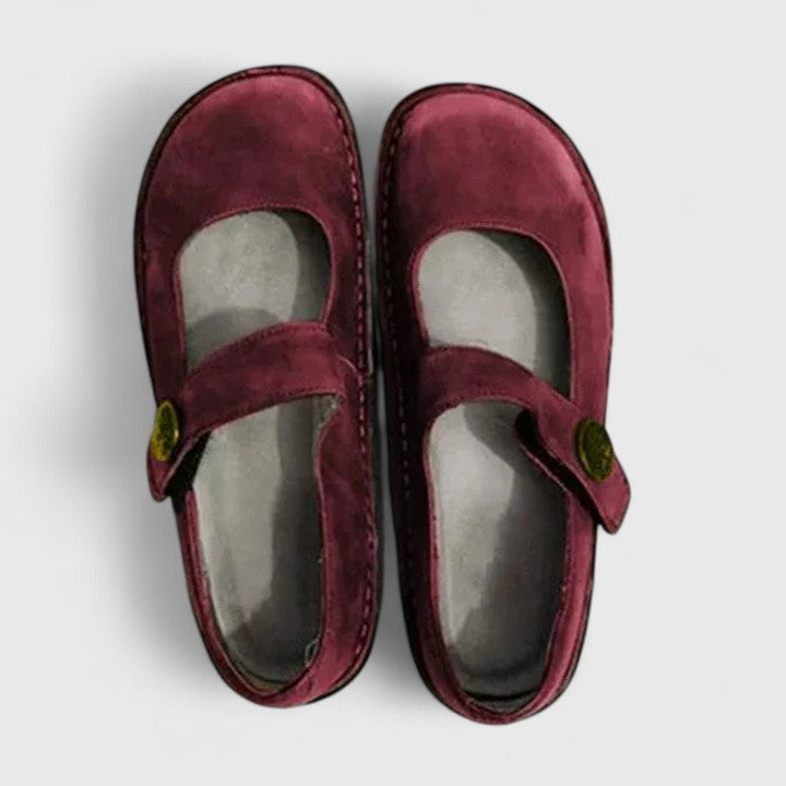 Comfortable classic Mary Jane shoes for women, featuring a rounded toe, low heel, and distinctive stitch sole.