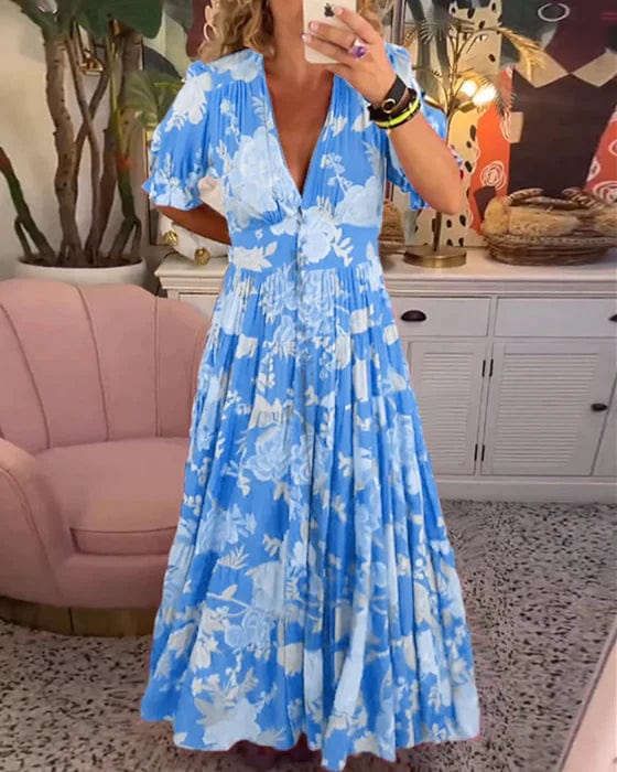 Comfortable plus size V-neck maxi dress for women, featuring a flowy design and practical side pockets.