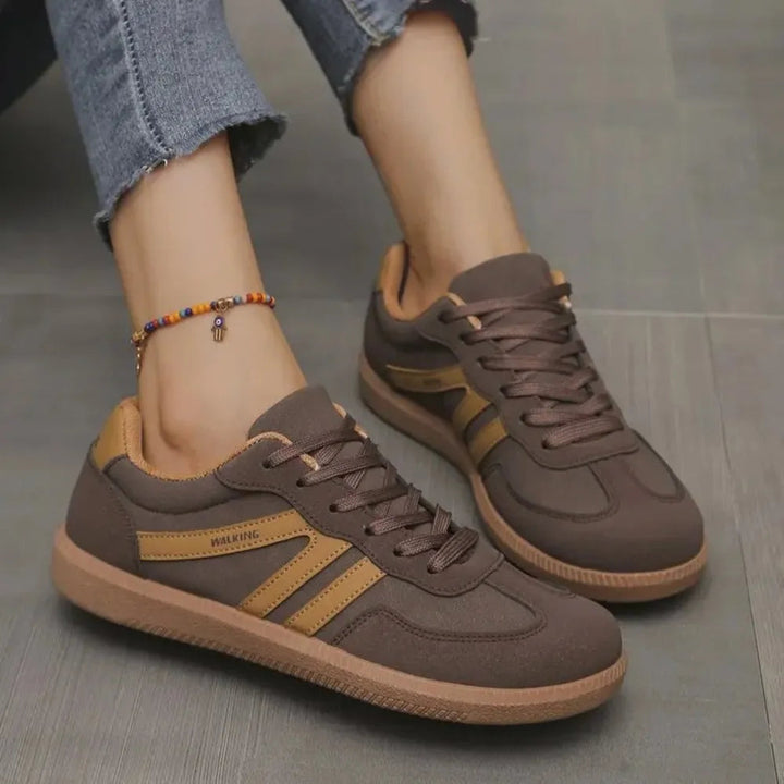 Stylish women's casual sneakers for iconic everyday wear. Comfortable, classic low-top footwear with versatile design.