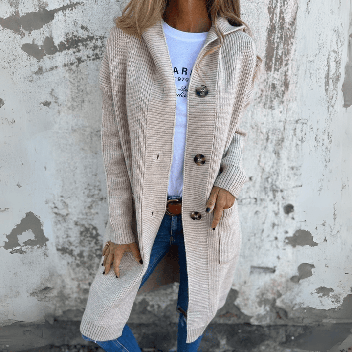 Women's long chic black cardigan, perfect for elegant layering or comfortable casual style.