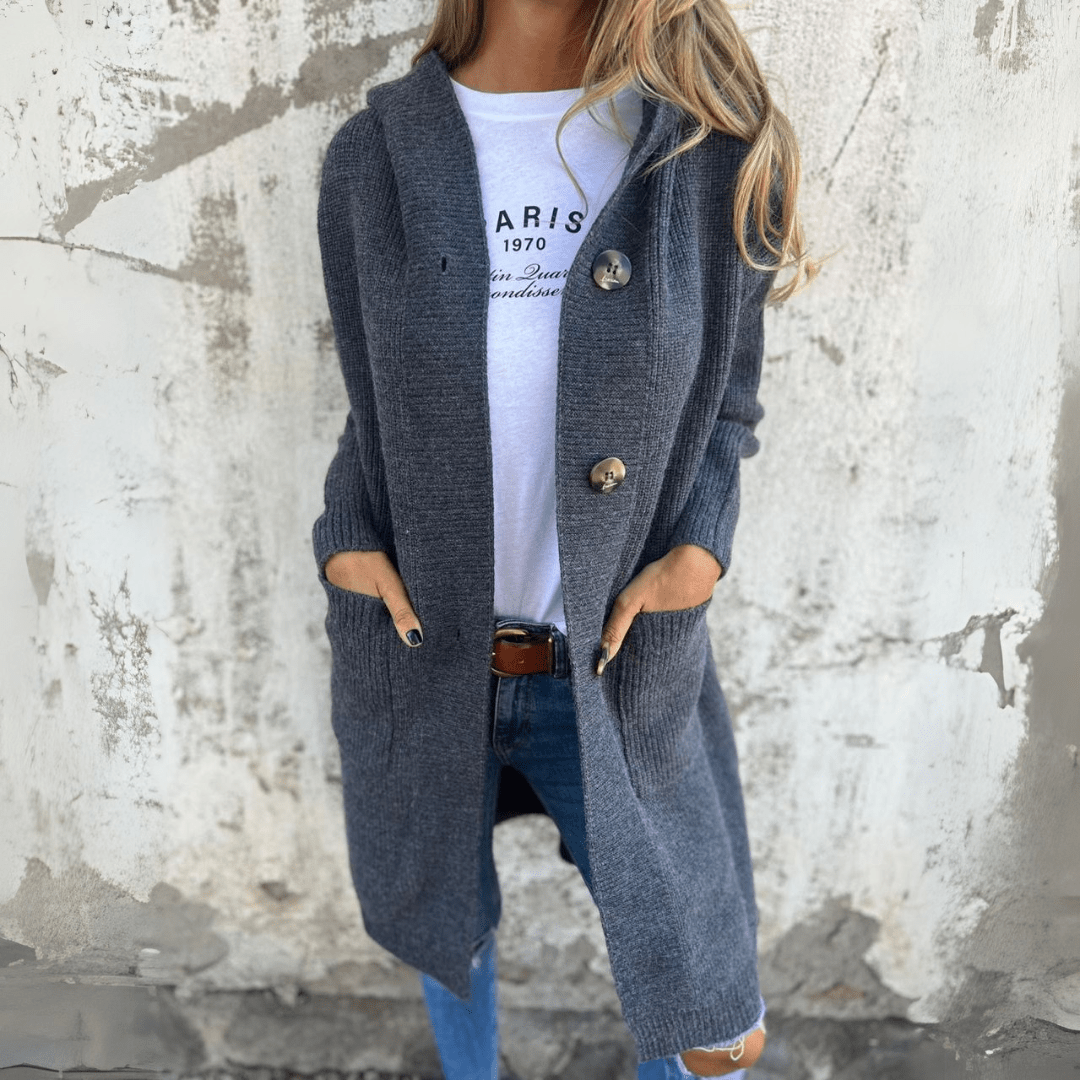 Stylish woman wearing a long chic cardigan, ideal for versatile layering over a casual or elegant outfit.
