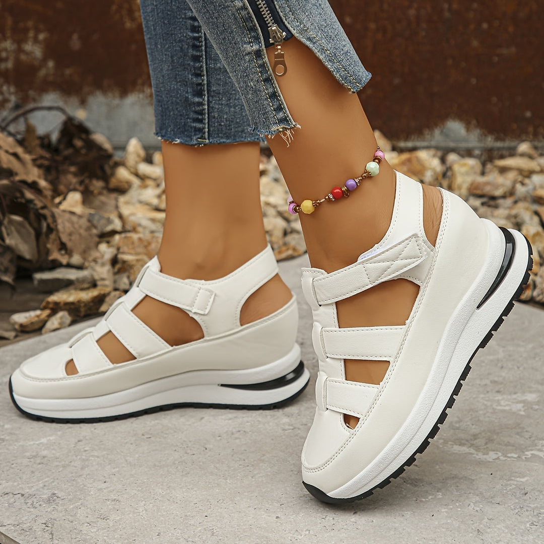 Black women's platform sandals, comfortable and stylish with a round toe, great for summer outfits.