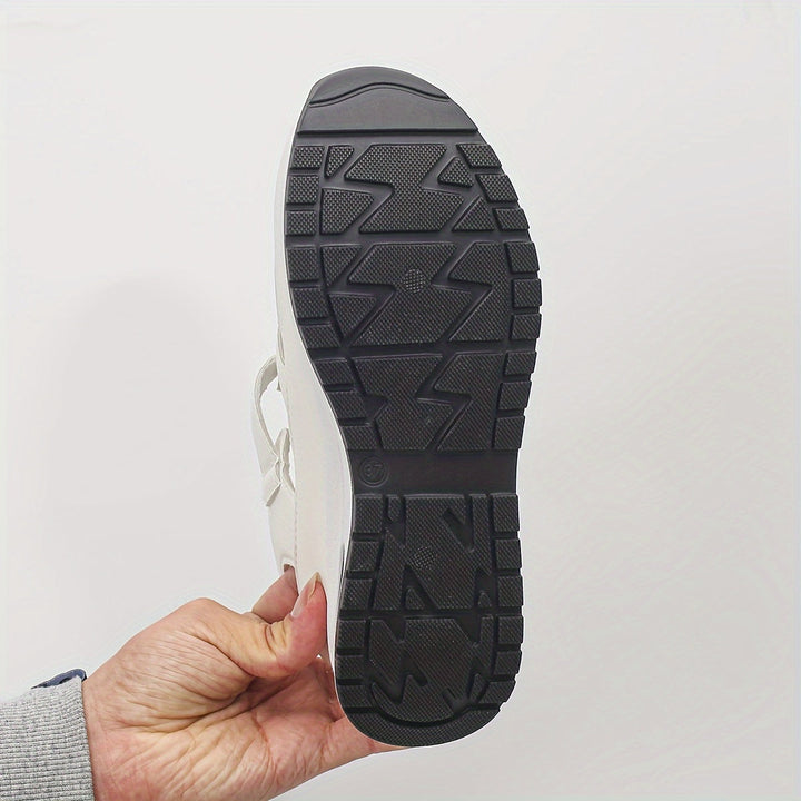 Women's stylish and comfortable platform sandals with a modern round toe design for summer.