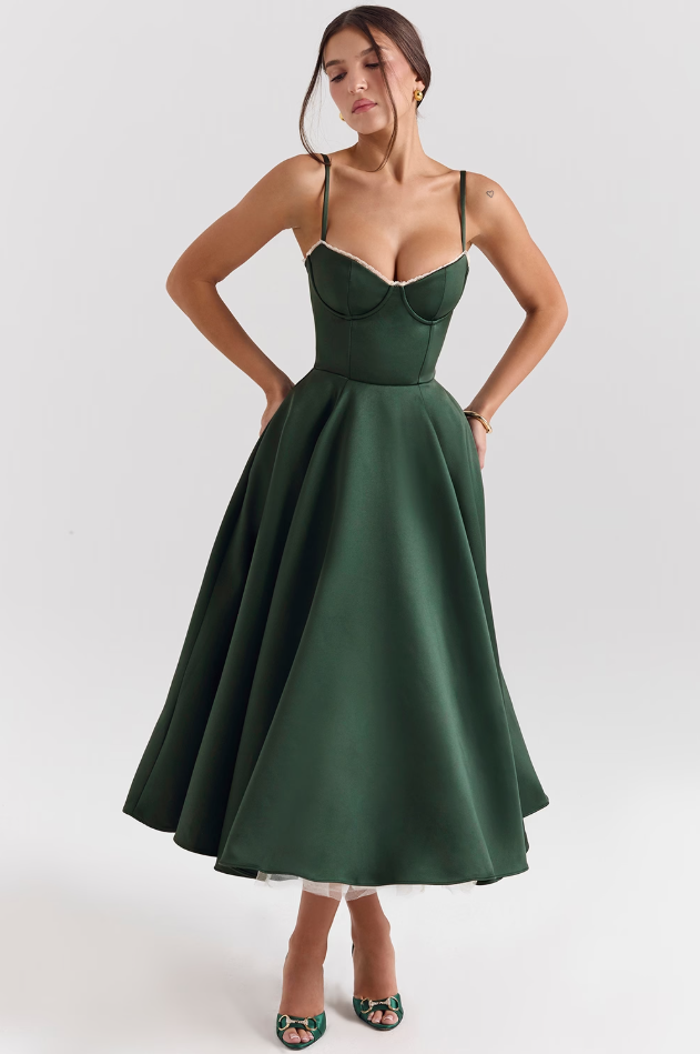 Women's elegant midi dress with a flowing skirt, ideal for parties & special events.