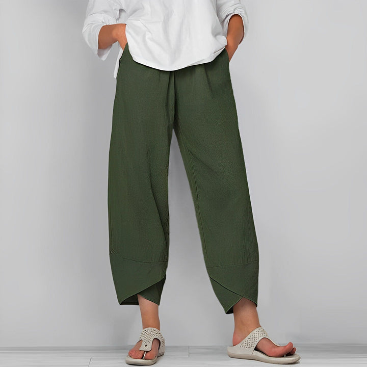 Modern women's wide asymmetric pants, featuring a flattering silhouette for versatile and chic everyday fashion.