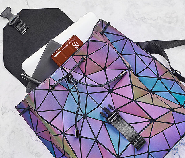 Reflective geometric women's backpack. Color-changing luminous faux leather, perfect stylish bag for daily use.