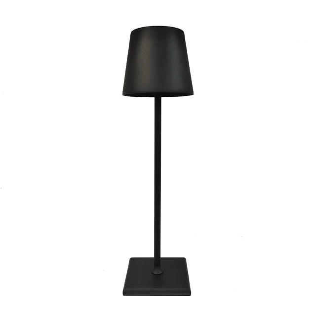 Modern LumoGlow wireless LED table lamp, rechargeable, portable, enhancing any room's decor.