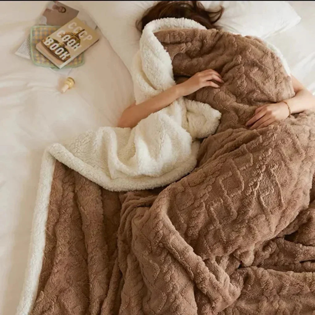 Luxurious unisex plush winter blanket, super soft and warm for ultimate coziness and insulating comfort.